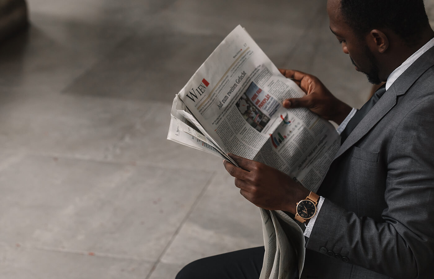 men with newspaper